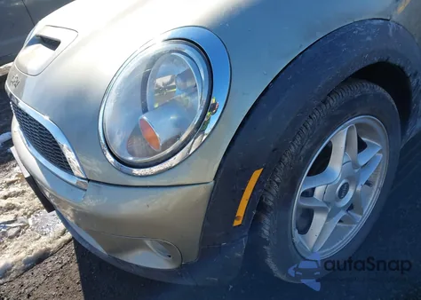 2009 Mini Cooper S z USA, uszkodzony, nr VIN WMWMF735X9TW87772